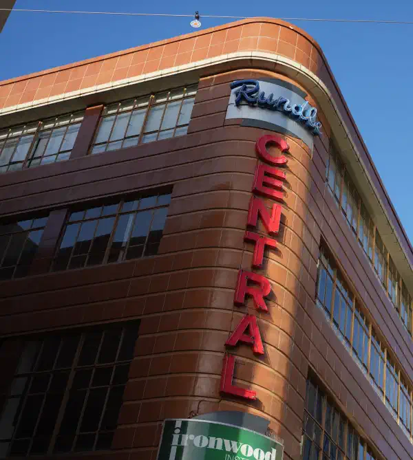 Corner of a building, with the words 'Rundle' across the top and 'Central' written downwards in large red letters.