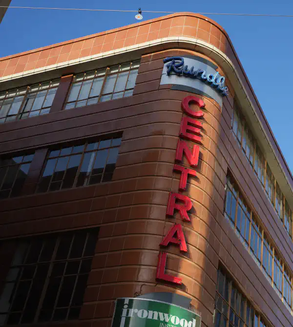 Corner of a building, with the words 'Rundle' across the top and 'Central' written downwards in large red letters.